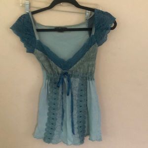 Very cute cap sleeve blue shirt.